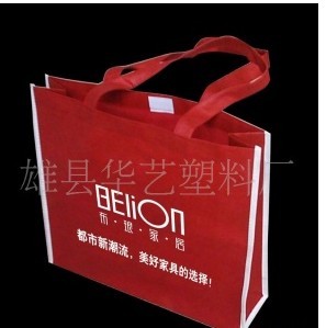 厂家生产无纺布宣传袋，西服袋，广告袋，广告围裙，